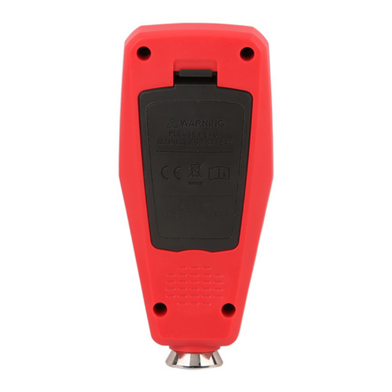 back side of a dry film thickness gauge with warning label on a white background