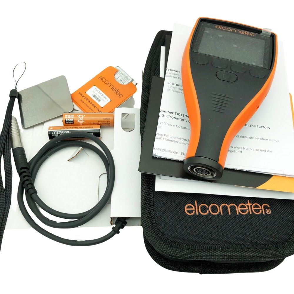 Elcometer 456 Separate Coating Thickness Gauge full kit with instrument, separate probe, carry pouch, calibration foils, test plates, AA batteries, user manual and calibration certificate for industrial DFT testing.
