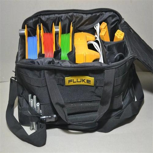 The FLUKE 1625-2 GEO Earth Tester and all accessories organized inside the open, professional-grade carrying case for portability.