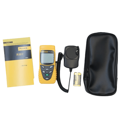 The complete FLUKE 941 lux meter kit including the device, 9V battery, user manual, and protective soft carrying pouch.