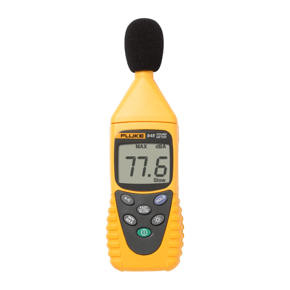 Fluke 945 digital sound level meter displaying a MAX hold reading of 77.7 dBA on its backlit LCD screen for professional noise assessment.