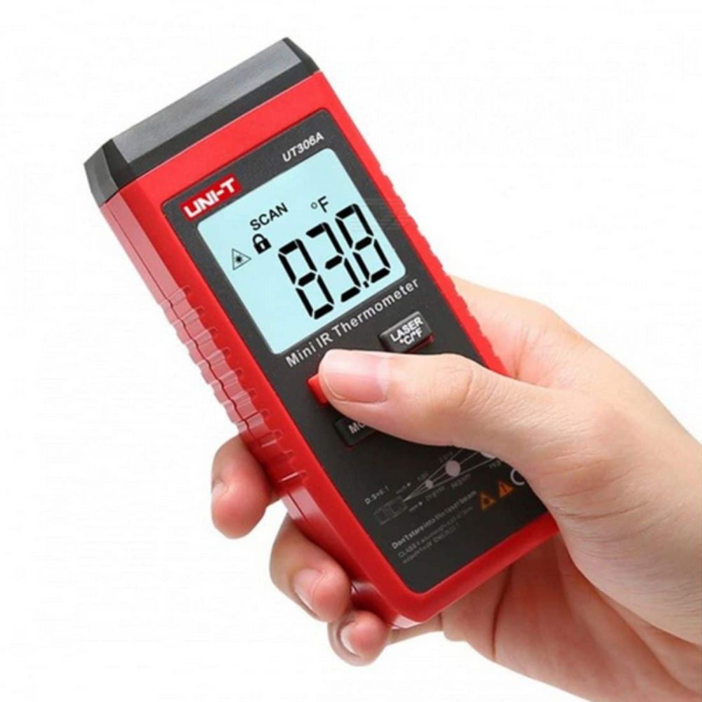 Close-up of hand holding the ultra-compact UNI-T UT306A non-contact temperature gun, designed for easy one-handed operation and safety inspections