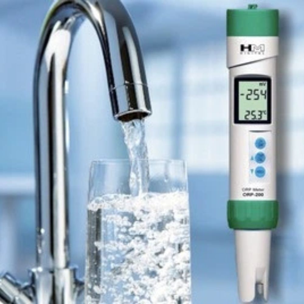 HM Digital ORP-200 ORP meter being used to test drinking water quality for oxidation-reduction potential measurement in water treatment and RO systems