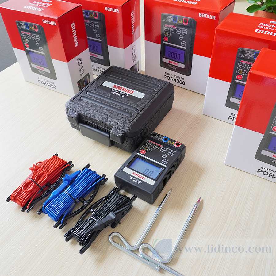 The full SANWA PDR4000 earth tester package laid out, displaying the meter, auxiliary earth spikes, wire spools, test leads, and carrying case.