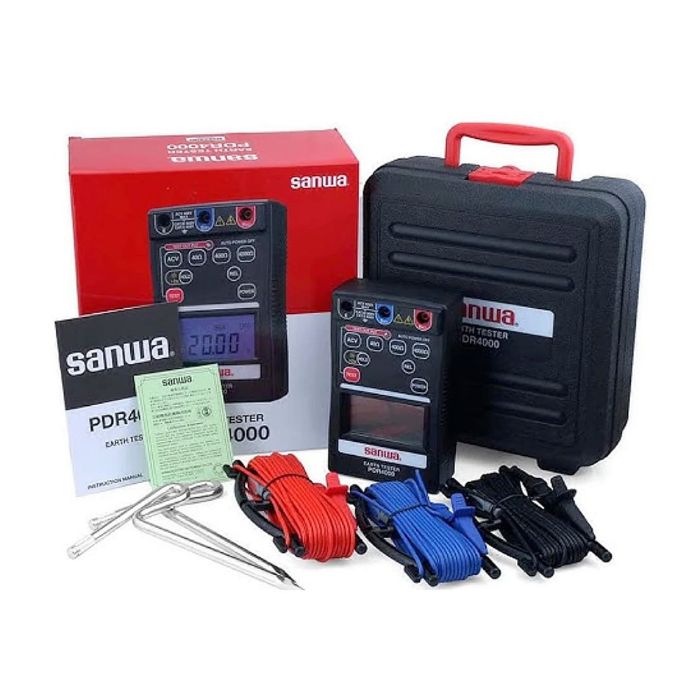 The SANWA PDR4000 ground resistance meter surrounded by all its standard accessories, including test leads and earth spikes, for a complete kit overview.
