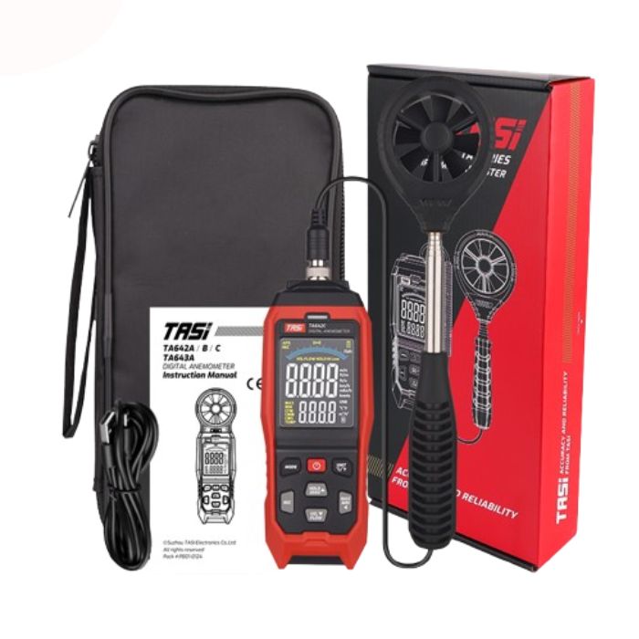 The complete TASI TA642C data logger anemometer package, including the main unit with test display on, telescopic vane probe, retail box, user manual, USB Type-C cable, and carrying pouch.
