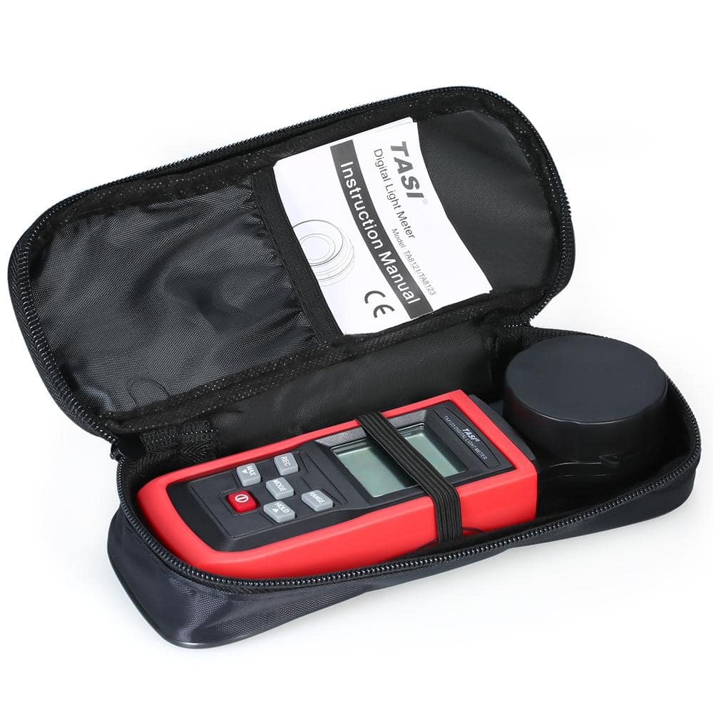 The portable TASI TA8121 lux meter and its manual stored inside the included soft carrying pouch for protection and transport.
