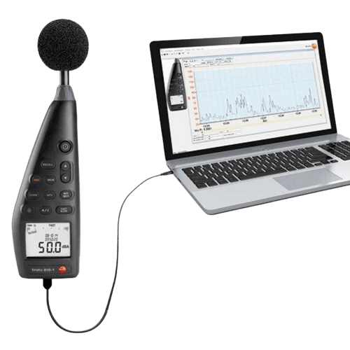 TESTO 816-1 data logger connected to a laptop via USB, displaying real-time acoustic graphs and analysis using the official Testo software for noise monitoring and reporting.