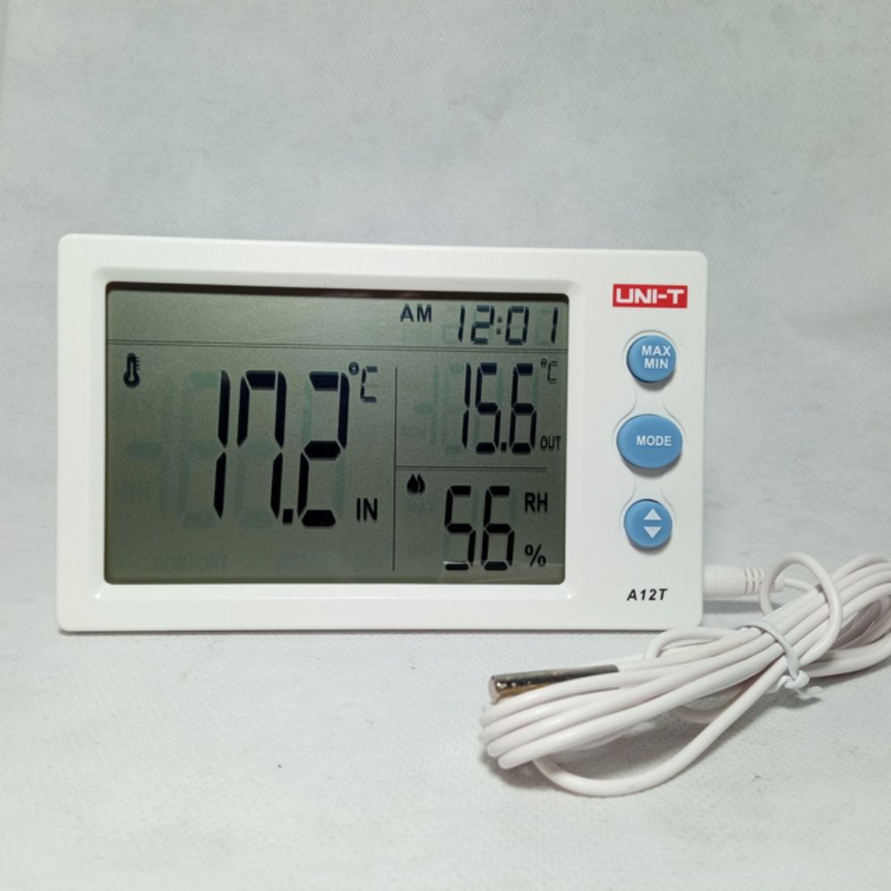 UNI-T A12T digital thermo hygrometer with external probe connected, displaying 17.2°C internal temperature, 56% RH humidity and 15.6°C external temperature for cold room, freezer and storage monitoring.