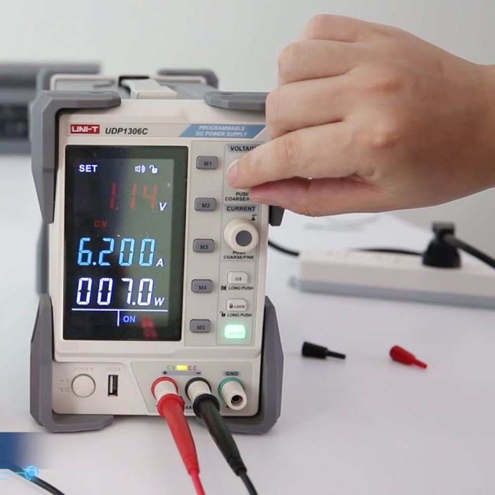 UNI-T UDP1306C 32V bench power supply performing precision calibration – linear DC source for laboratory instrument verification and electronics calibration.