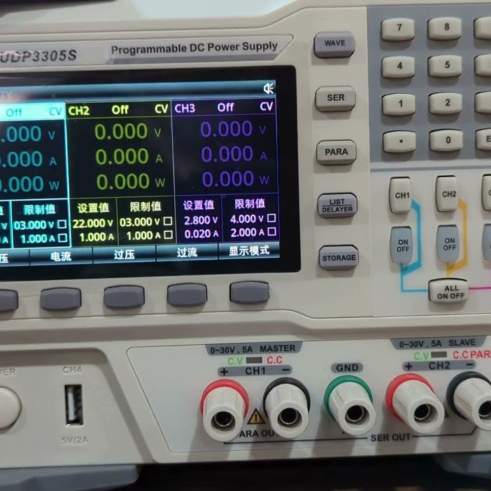UNI-T UDP3305S 30V linear bench power supply display closeup – 4-channel color LCD showing voltage current power readings for precision electronics testing.