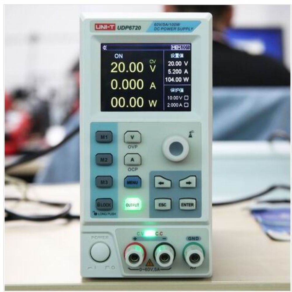 UNI-T UDP6720 programmable variable DC power supply operating during electronics testing showing active voltage and current output, precision regulated bench PSU used for circuit prototyping, embedded system development, battery testing and electronics troubleshooting.