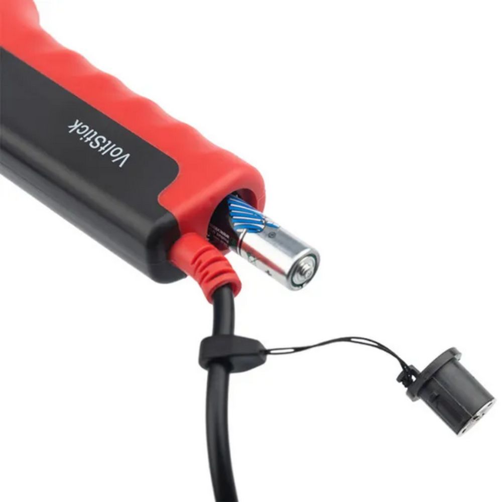 Open rear battery compartment of the UNI-T UT15C electrical continuity tester, displaying the secure placement for two AAA batteries.