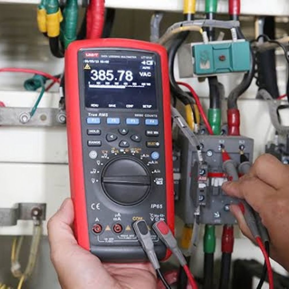 UNI-T UT181A datalogging multimeter measuring voltage on an industrial distribution board