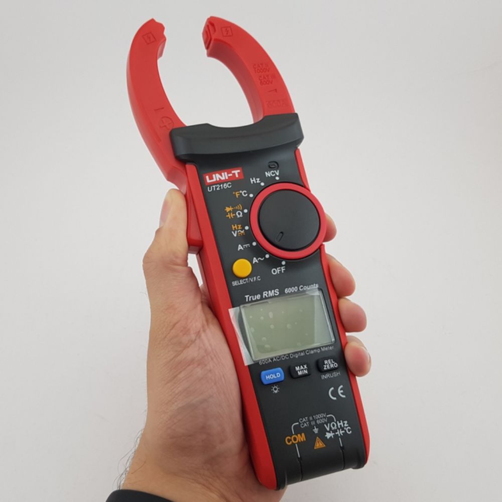 UNI-T UT216C digital clamp meter showing clamp jaw opening for clamping around power cables – 600A True RMS current measurement for mains wiring, distribution boards and industrial motors Sri Lanka.