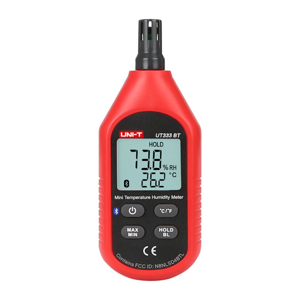 UNI-T UT333BT mini temperature and humidity meter with backlit LCD on, showing 26.2°C and 73.8% RH, featuring Bluetooth connectivity for wireless environmental data logging.