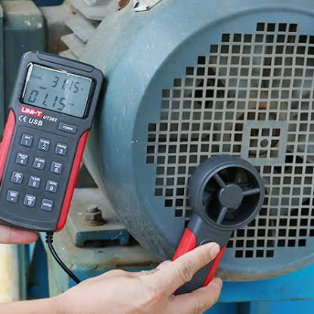 UNI-T UT362 vane anemometer measuring wind speed at a motor cooling impeller