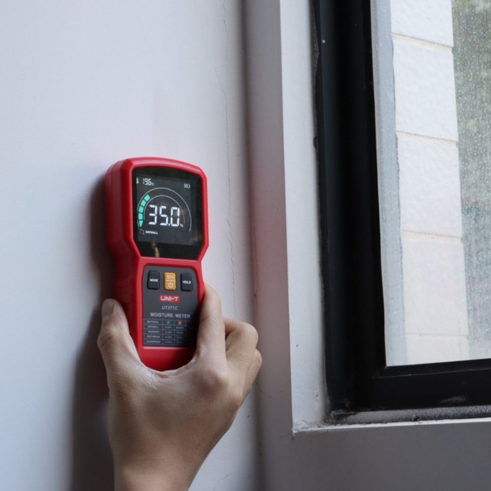 UNI-T UT377C pinless drywall moisture meter scanning gypsum board wall, drywall mode 35% moisture reading, restoration water damage detector for painters tilers home inspectors