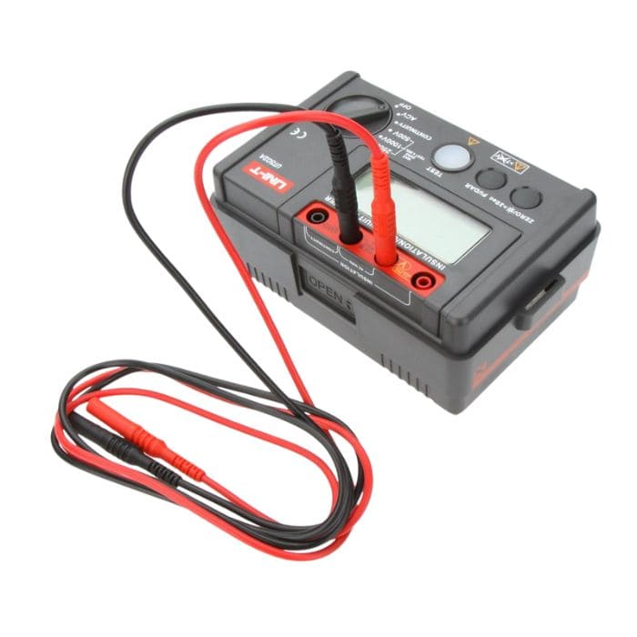 The UNI-T UT502A insulation tester powered off with test leads connected, ready for field measurement use.