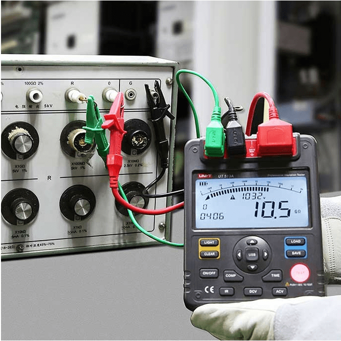 UNI-T UT513A high voltage insulation tester showing 10.5 gigaohm insulation resistance reading during calibration with process calibrator, digital megohmmeter for electrical testing
