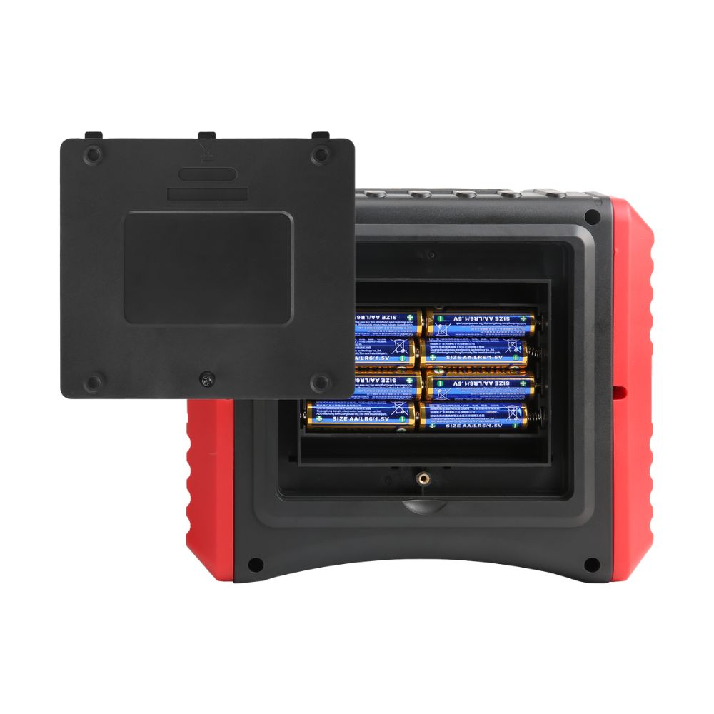 UNI-T UT586+ Three-Phase RCD ELCB Tester back view with battery cover removed showing 8-cell battery compartment