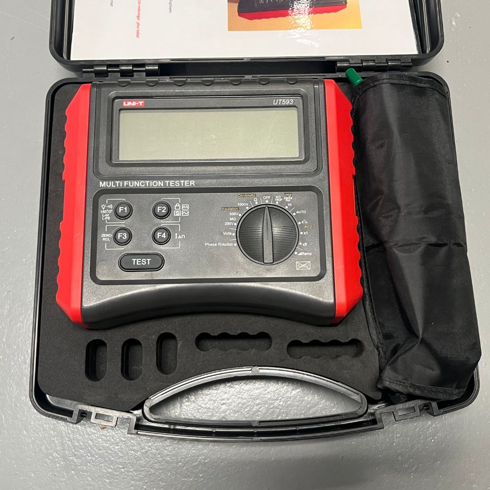 UNI-T UT593 Multifunction Installation Tester neatly arranged inside the carrying plastic box