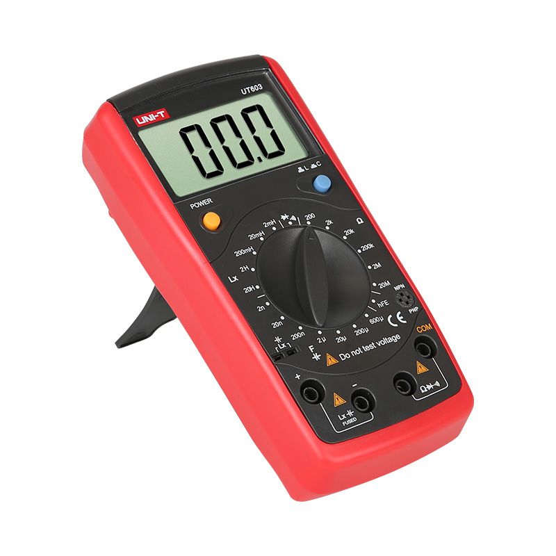 Side View of UNI-T UT603 Precision Ohmmeter - Macro Shot of Low Resistance Testing Setup - 200 Ohm Range Selected for Shunt Resistor Check - Ergonomic Handheld Multimeter Design