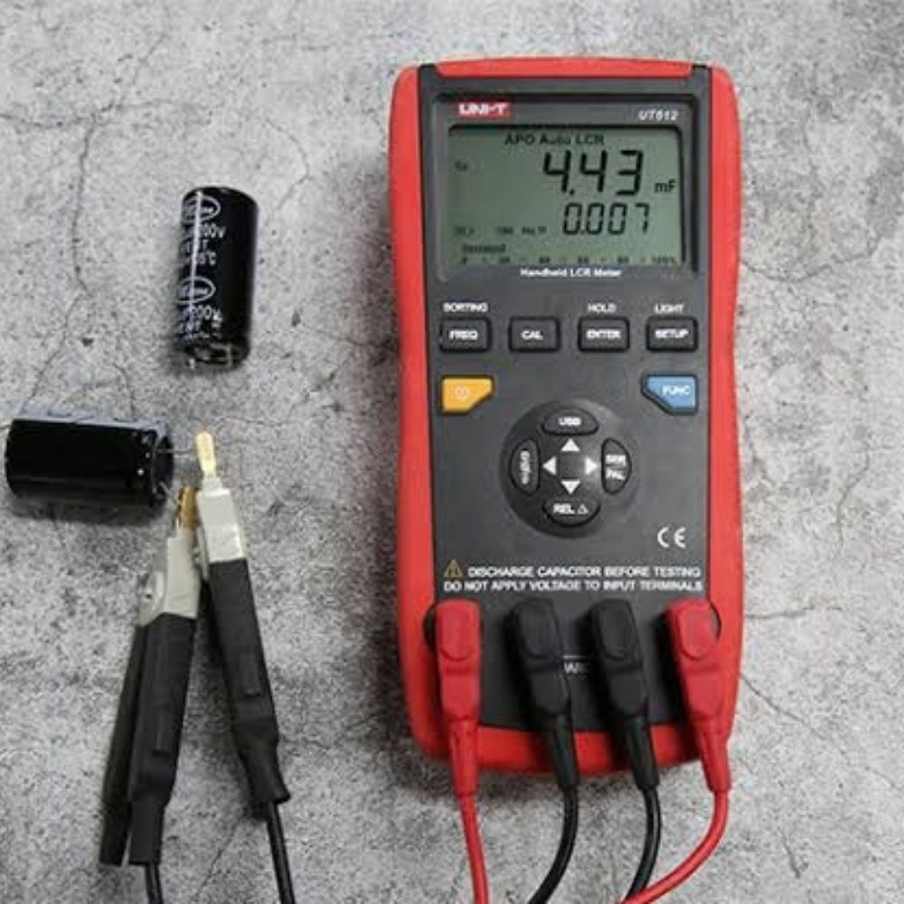 UNI-T UT612 LCR meter measuring capacitance of an electrolytic capacitor