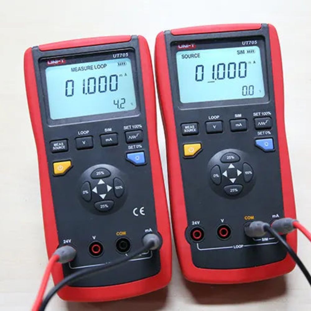 UNI-T UT705 Loop Process Calibrator simultaneously powering and testing two industrial instruments with 24V loop supply and 4-20mA signal output demonstrating multi-device calibration capability.