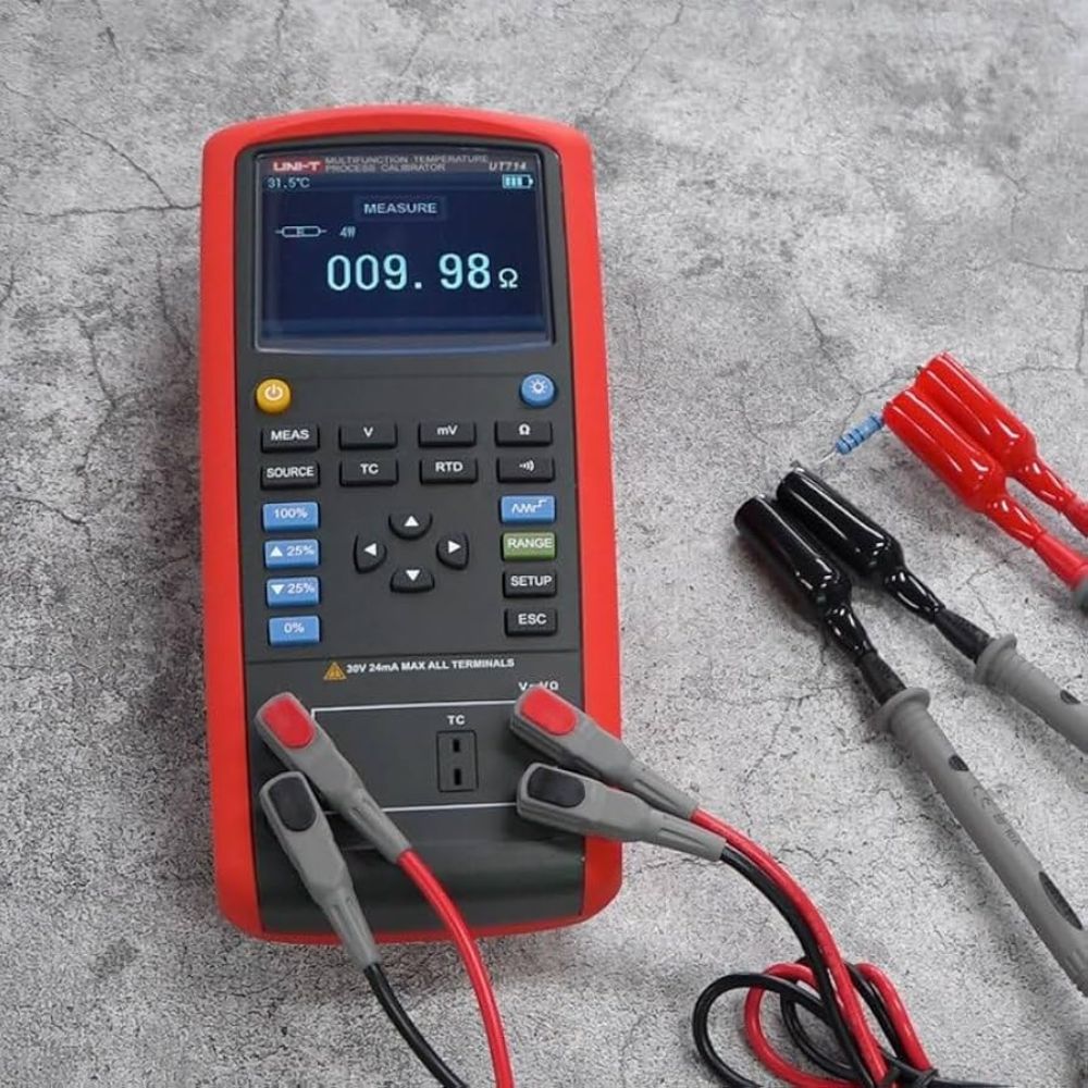 UNI-T UT714 process calibrator with test leads connected, ready to source and measure RTD resistance and thermocouple signals in the field.