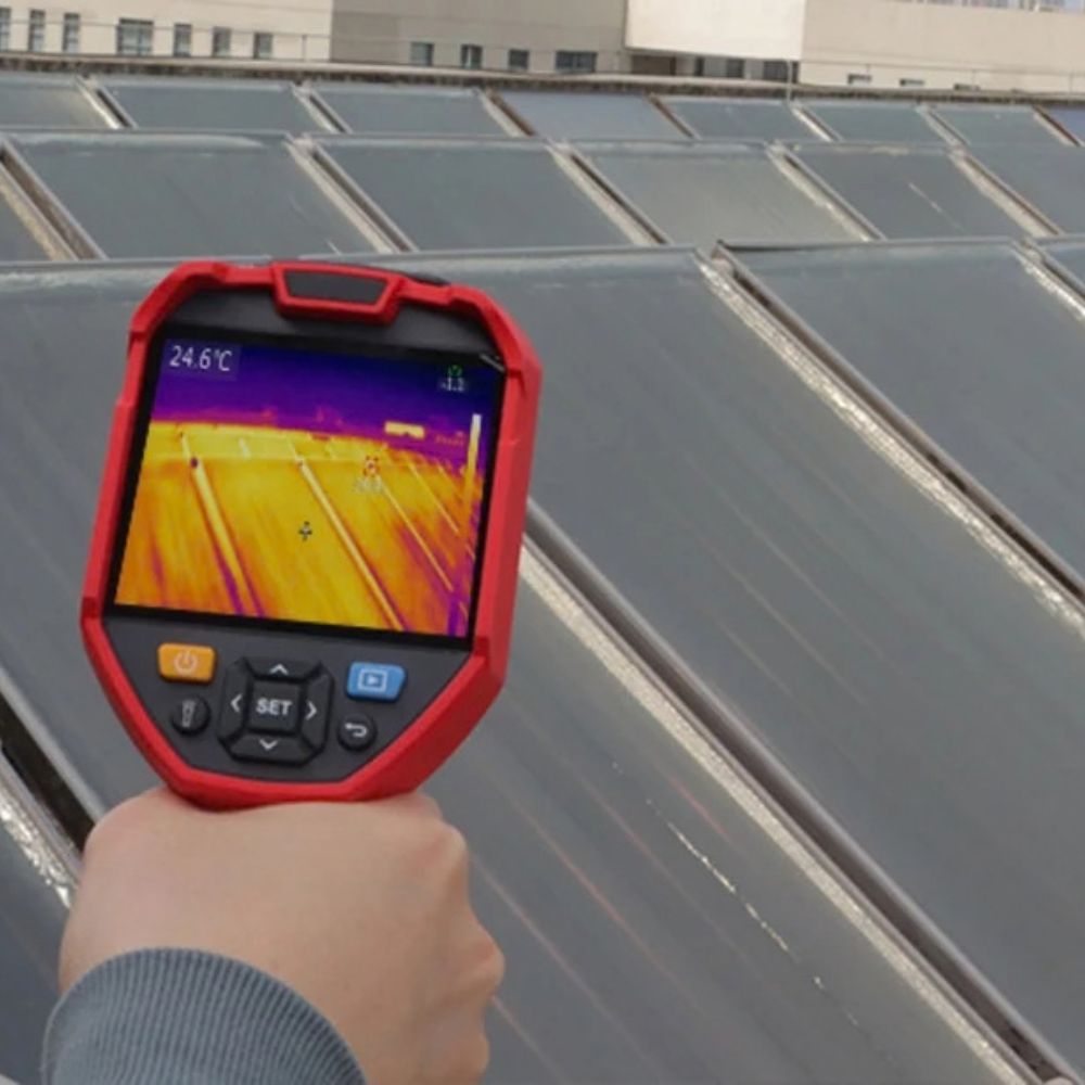 UNI-T UTi720E thermal camera monitoring an industrial solar panel energy system