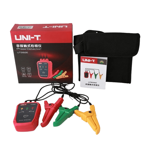 The UNI-T UT262E phase rotation tester with full test lead set spread on a surface, includes retail box, user manual, leads, and carrying pouch.