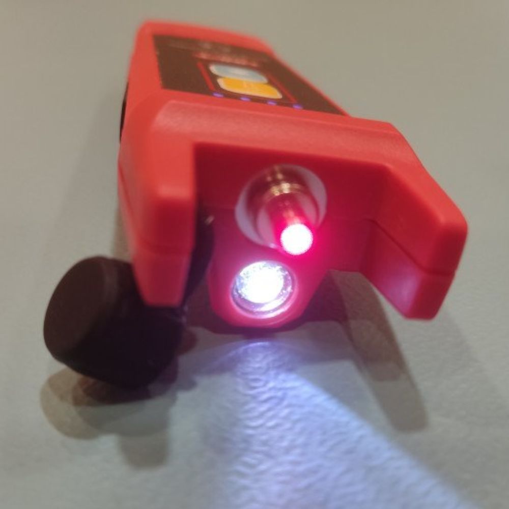 The 2.5mm universal optical adapter on the UT691-01 VFL emitting a highly focused 1mW red laser for precise cable break detection.